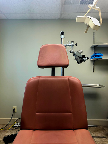 An exam chair in a doctor's office.