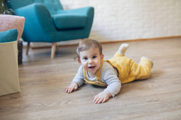 istock Cute baby in yellow 1248462633