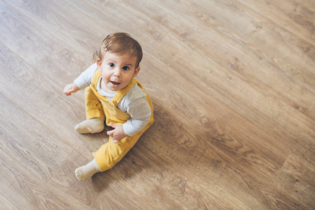 istock Cute baby in yellow 1248463884