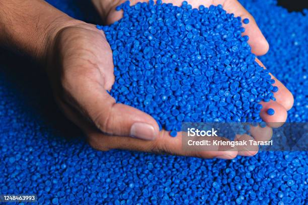 Blue Plastic Grain Plastic Polymer Granules Hand Hold Polymer Pellets Raw Materials For Making Water Pipes Plastics From Petrochemicals And Compound Extrusion Resin From Plant Polyethylene Stock Photo - Download Image Now