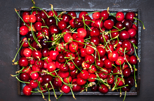 Cherry fruit in a box freshly picked top view