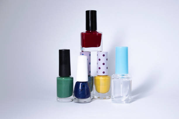 istock Bottles with nail polish on white background. nail lacquer. Nail manicure concept. Isolated, copy space 1248474539