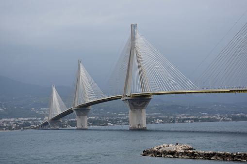 The Rio-Andirrio Bridge (Greek Γέφυρα Ρίου-Αντιρρίου Géfyra Ríou-Andirríou) or officially Charilaos-Trikoupis Bridge (Γέφυρα Χαρίλαος Τρικούπης) is a road bridge in Greece over the Strait of Rio-Andirrio (Στενό Ρίου-Αντιρρίου), which forms the entrance to the Gulf of Corinth. It was opened in 2004 and connects Andirrio on the north bank with Rio in the Peloponnese, eight kilometers east of Patras.