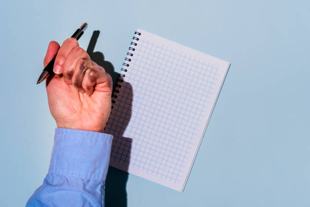 istock Dirty left hand after writing in blue 1248482422