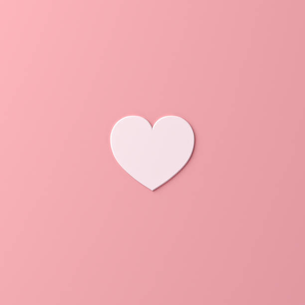 istock Abstract white heart shape isolate on pink pastel color background with shadow 1248484679