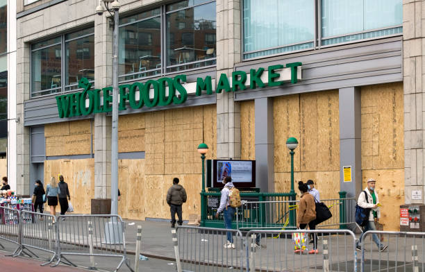 Whole Foods Market closed to prevent looting during George Floyd protest NYC New York, New York/USA - June 2, 2020: Whole Foods Market closed to prevent looting during George Floyd protests in lower Manhattan. george floyd protests stock pictures, royalty-free photos & images
