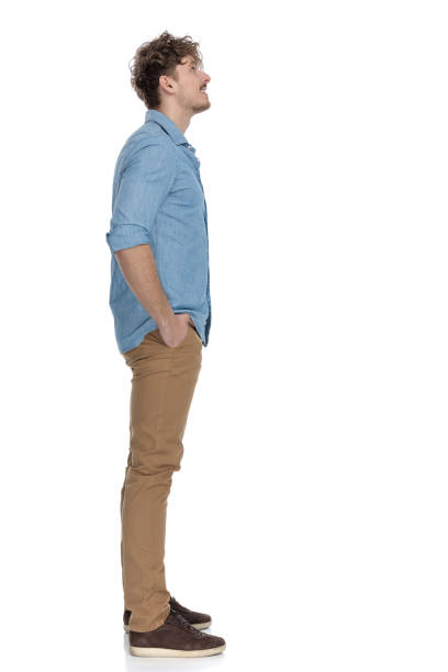 istock side view of casual model holding hands in pockets 1248489233