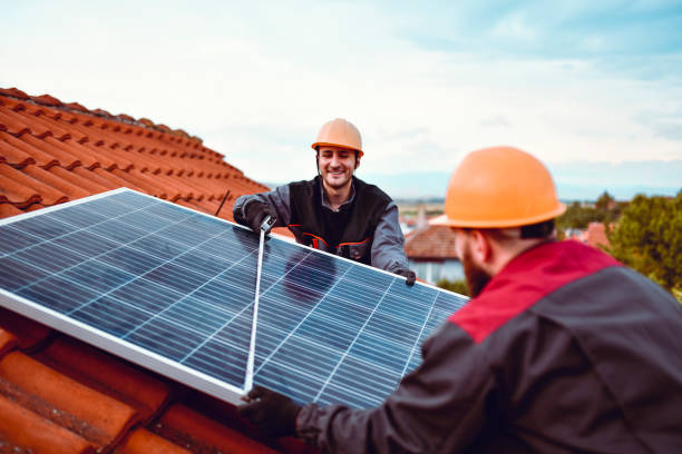 Males Checking Solar Panel Width Males Checking Solar Panel Width dragging photos stock pictures, royalty-free photos & images