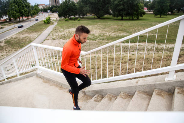 istock Young man exercising on a staircase 1248500305