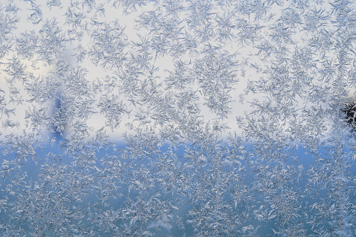 winter pattern of ice crystals on glass.