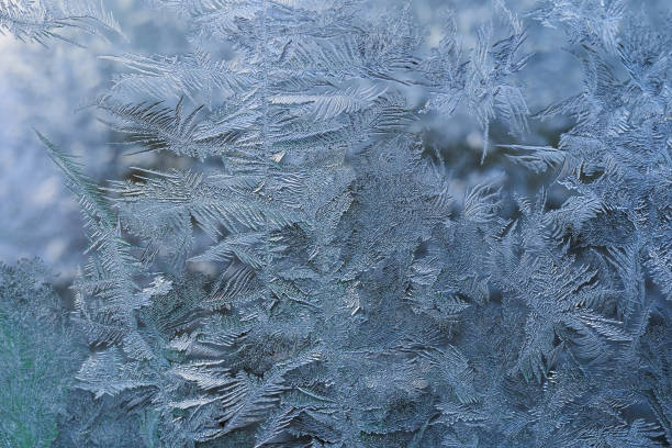 istock winter pattern of ice crystals on glass 1248503000
