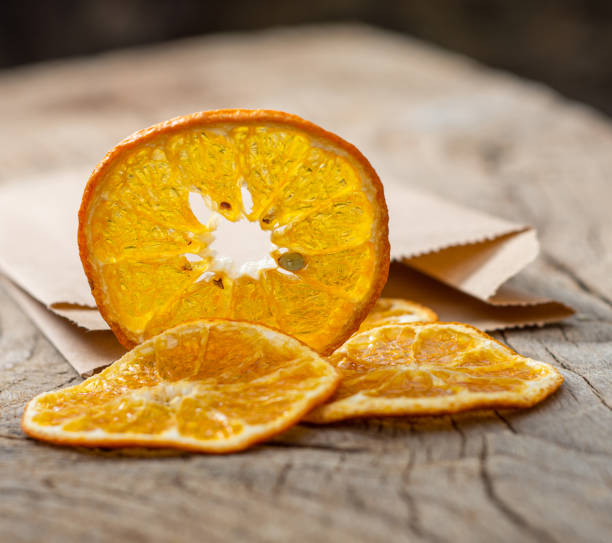 istock Slices of dried tangerines in craft package 1248504519