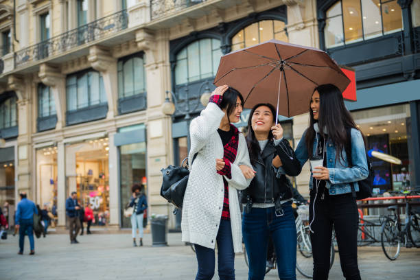 istock Three asian best friends enjoy rainy day 1248504557