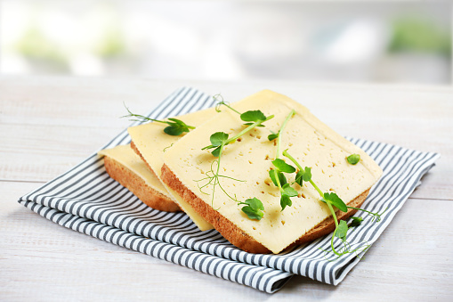 Bread slice and cheese sandwich.Breakfast toast.