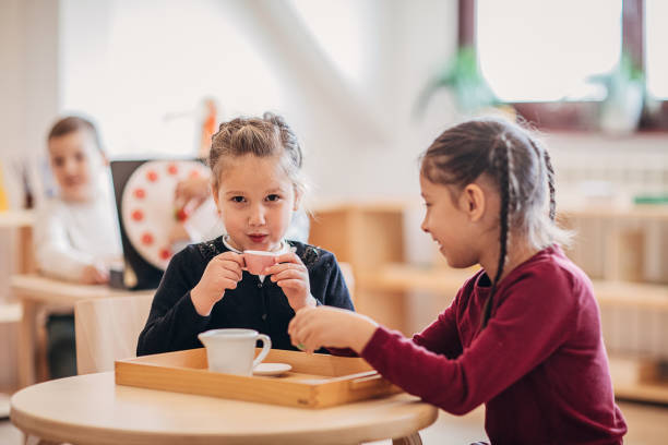 istock Pretend play tea party at their preschool classroom 1248510242