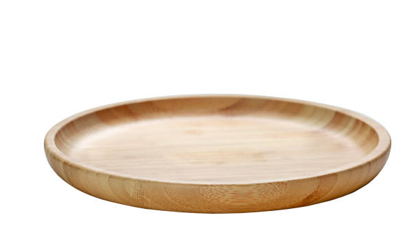 istock Wooden plate isolated on white,empty dish. 1248510876