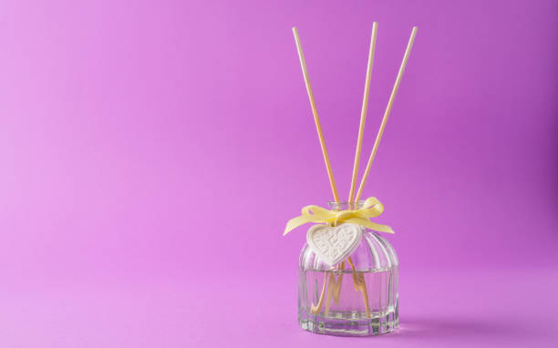 istock Aroma diffuser on pink background with copy space. Decoration, hygge and aromatherapy concept. Good scent at home 1248512066