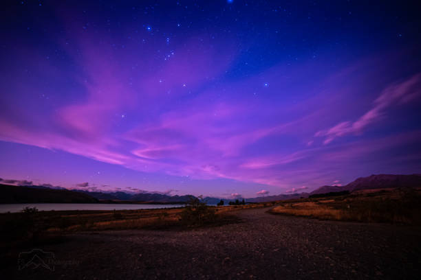 istock Pink clouds after sunset in a starry sky 1248514709