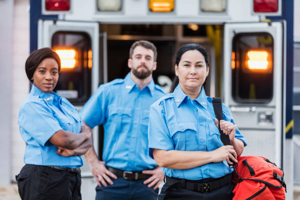 istock Paramedics standing at the rear doors of an ambulance 1248521605
