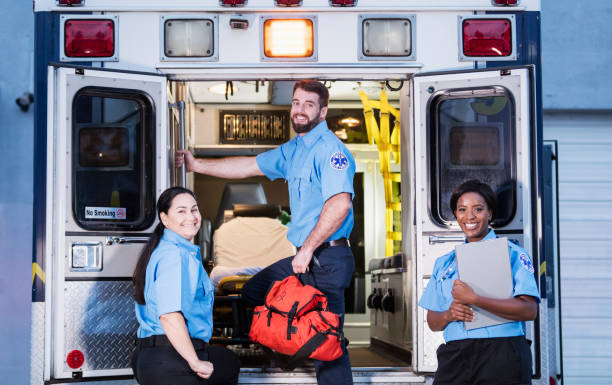 istock Paramedics at the rear doors of an ambulance 1248521929
