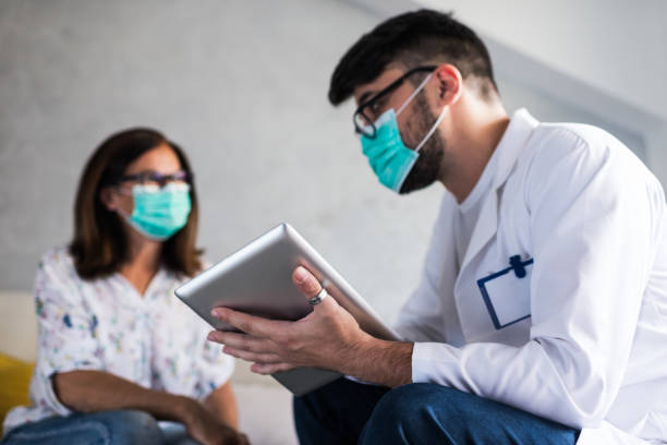 istock Healthcare worker at home visit 1248525927