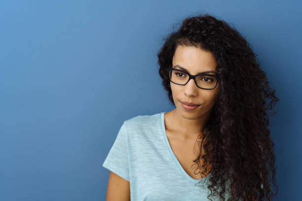 istock Young woman looking thoughtfully aside 1248528263