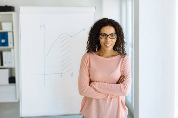 istock Young businesswoman giving a presentation 1248529255