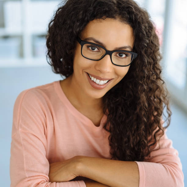 istock Smiling confident friendly young African woman 1248529304