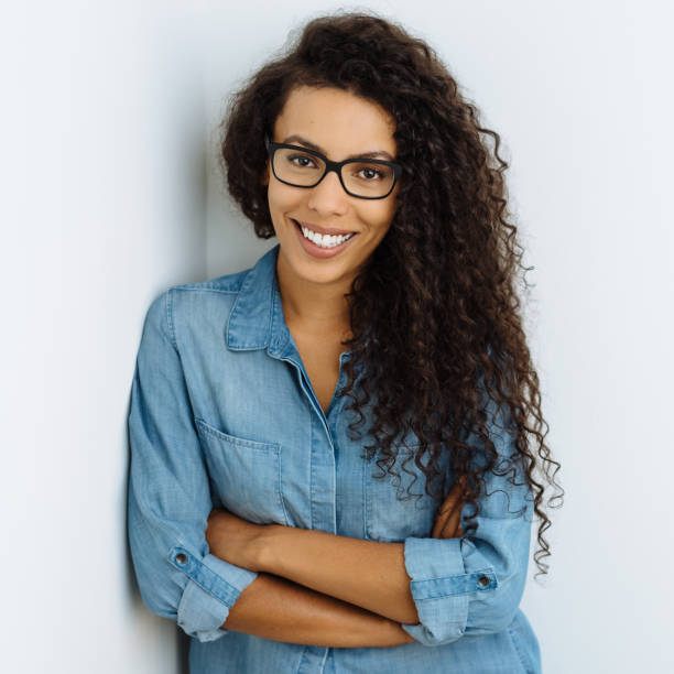istock Young friendly woman with a lovely smile 1248530840