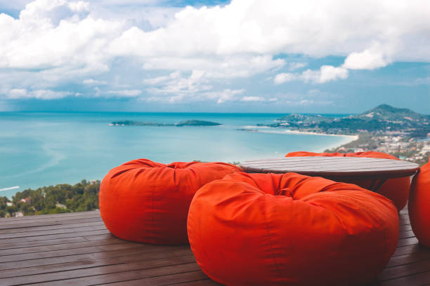 istock comfortable ottomans on top of a mountain with ocean views 1248531439
