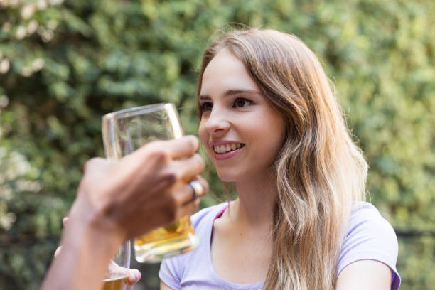 istock Couple talking at outdoor drink bar 1248531611