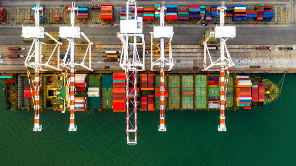 istock Aerial top view container ship working at night, Global business import export logistic and transportation around the world by container cargo freight ship. 1248533048