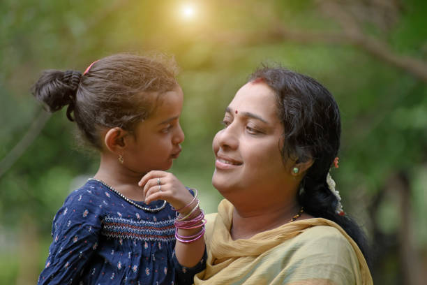 istock Mother And Daughter In Park 1248533430