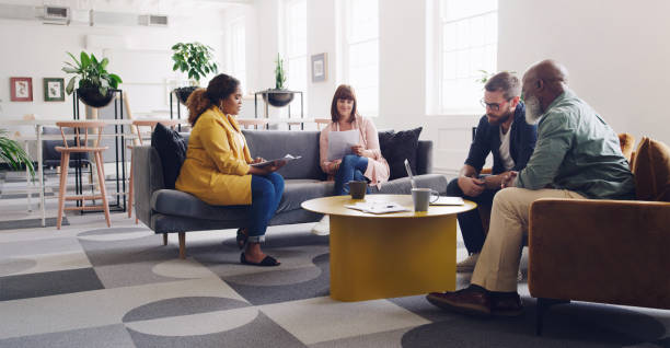 istock Open plan offices are intended to encourage collaboration 1248537476