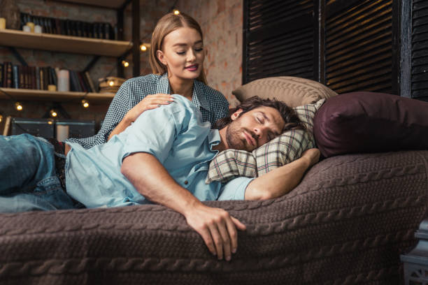 istock Couple taking a rest at home 1248543808