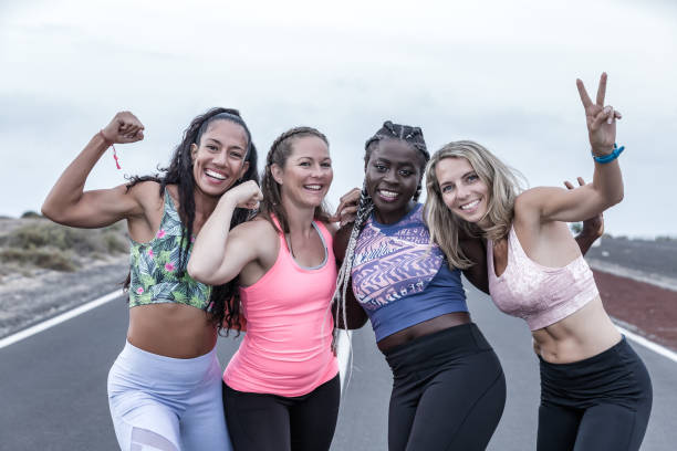 istock Happy diverse sportswomen gesticulating and smiling 1248543955