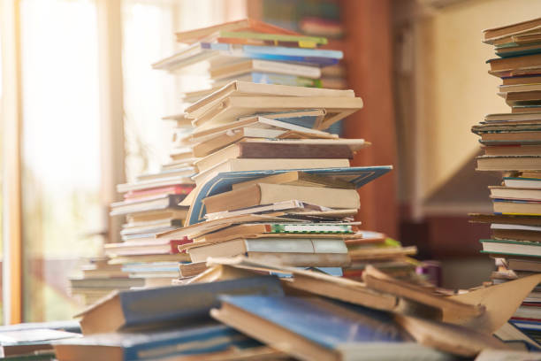 istock pile of old books on the table 1248546209