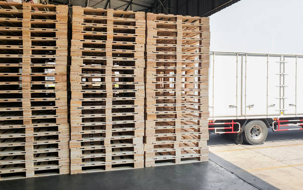 istock Stack of wooden pallets at the warehouse. 1248546268