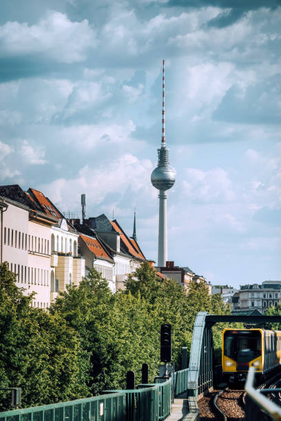 istock Berlin Skyline with TV Tower and subway train 1248546331