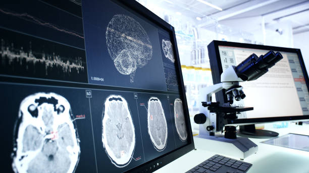 istock Futuristic laboratory equipment. Brainwave scanning research on computer screens 1248549011