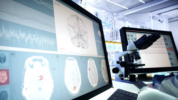 istock Futuristic laboratory equipment. Brainwave scanning research on computer screens 1248549060