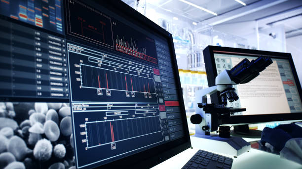 istock Futuristic laboratory equipment. DNA research on computer screens 1248549078