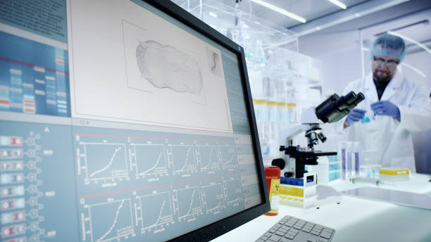 istock Scientist in Laboratory Research. Water flea daphnia on Computer Screen 1248549103