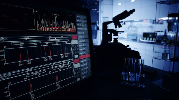 istock Futuristic laboratory equipment. DNA research on computer screens 1248549184