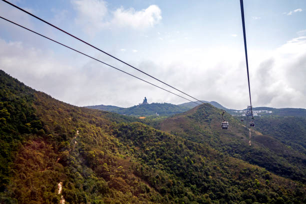 istock Big bronze Buddha statue on hill 1248550844