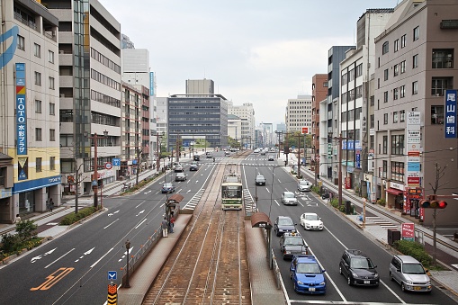 Street view in downtown Hiroshima, Japan. Completely destroyed by atomic bomb, Hiroshima is the largest city of Chugoku region with 1.17m population.