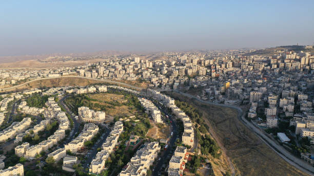 Security Wall divide Israel and Palestine- Aerial view Security Wall divide Israel and Palestine- Aerial view gaza strip photos stock pictures, royalty-free photos & images