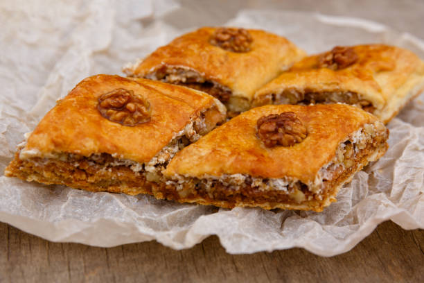 istock Eastern sweets - dessert baklava decorated with walnuts 1248556696