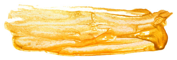 istock acrylic gold paint stain on a white background 1248558275