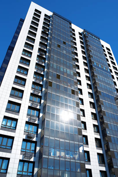 istock New multi-story houses and blue sky 1248558541